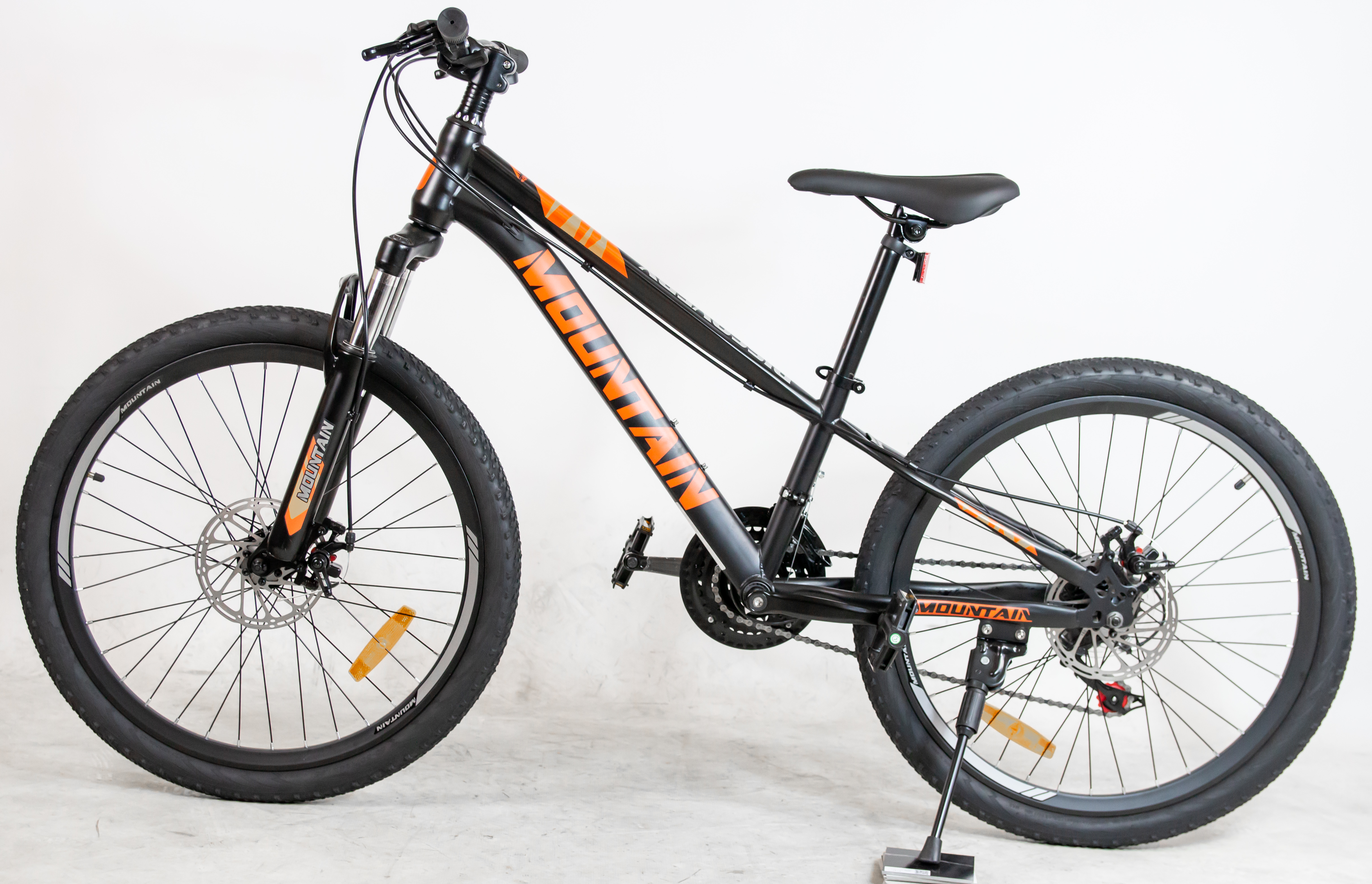 ROWER GÓRSKI MOUNTAIN MTB 24 CALI STALOWY CZARNO POMARAŃCZOWY